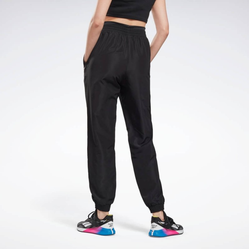 Reebok‏ Womens' Workout Ready Woven Joggers- بنطلون ريبوك وور ورك اوت ريدي للنساء لون أسود‏