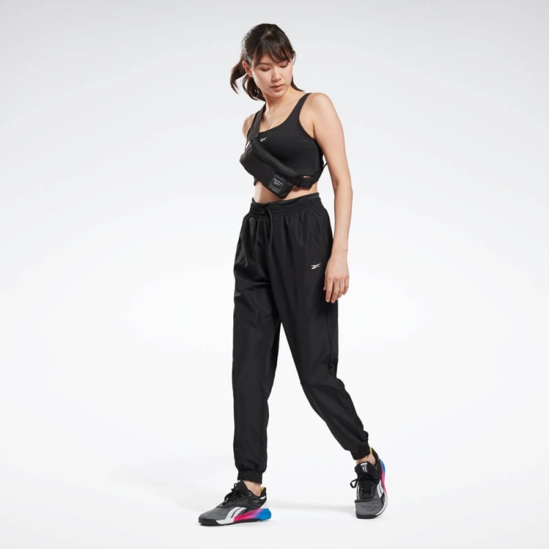 Reebok‏ Womens' Workout Ready Woven Joggers- بنطلون ريبوك وور ورك اوت ريدي للنساء لون أسود‏