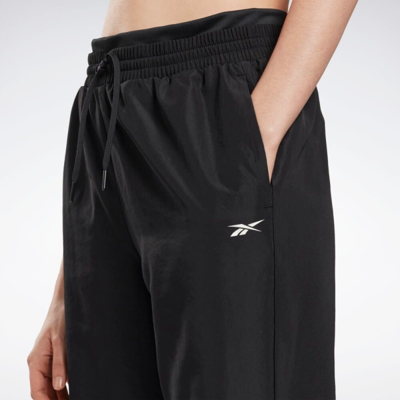 Reebok‏ Womens' Workout Ready Woven Joggers- بنطلون ريبوك وور ورك اوت ريدي للنساء لون أسود‏