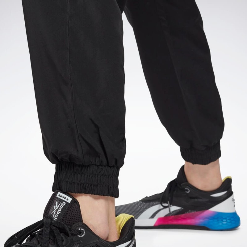 Reebok‏ Womens' Workout Ready Woven Joggers- بنطلون ريبوك وور ورك اوت ريدي للنساء لون أسود‏