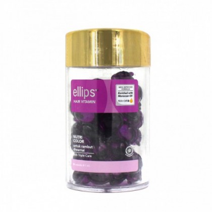 مرتبان كبسولات فيتامينات لحيوية الشعر