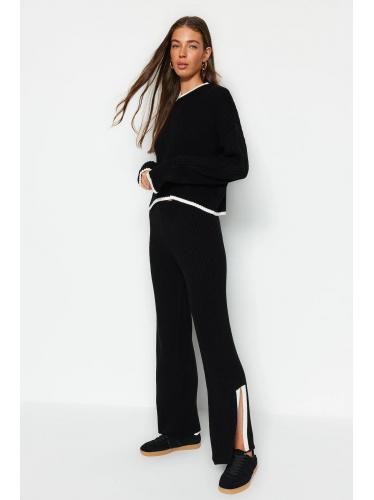 طقم تركي بنطلون وبلوزة مخططة  للنساء لون أسود