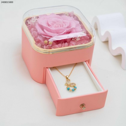 صندوق هدايا للمجوهرات زهري وذهبي مع ورد زهري