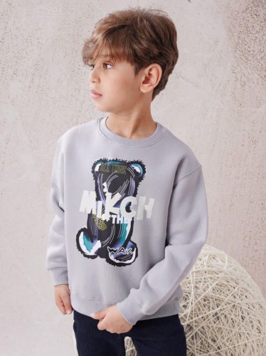 بلوزة ولادي بأكمام طويلة لون سكني